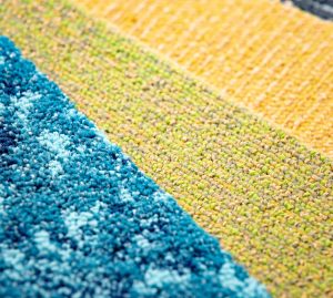 Nylon vs polypropylene carpet tiles – which is better for office